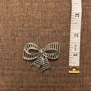 Silver looking brooch